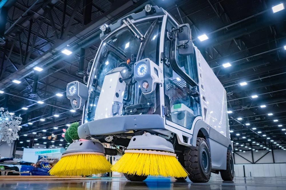 a floor sweeper in a warehouse.