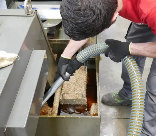 Worker using Industrial Cleaning Device